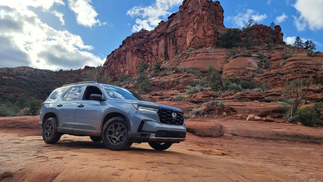 With all-wheel drive and all-terrain tires, the 2023 Honda Pilot TrailSport can scramble up slippery rocks on the Sedona trails.