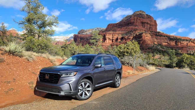 The 2023 Honda Pilot in Elite trim, the most expensive Pilot model offered. At $53K, it offers a quieter interior, chrome trim, head-up display and other goodies.