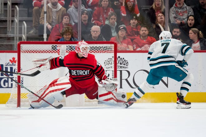 Detroit goaltender Ville Husso makes a save on a shot by San Jose center Nico Sturm during the third period.