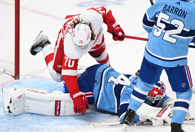 Detroit Red Wings' Oskar Sundqvist (70) scores against Montreal Canadiens goaltender Jake Allen during second-period.
