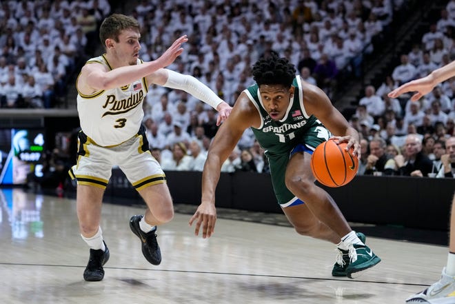 Michigan State guard A.J. Hoggard (11) drives on Purdue guard Braden Smith (3) during the first half.