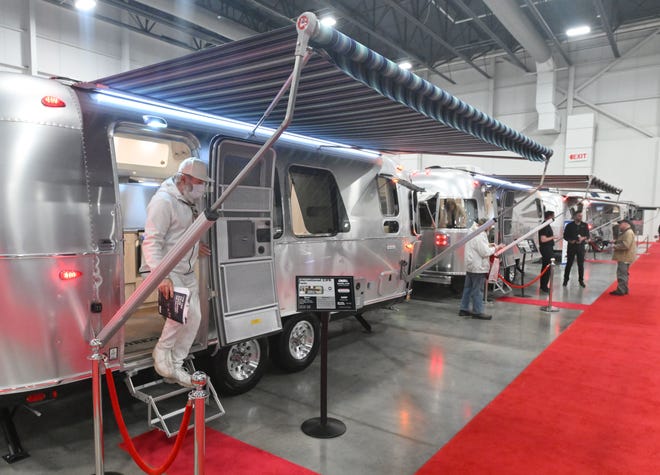 A row of Airstreams alway draws attention including this International 23FB Twin at the Marvac RV and Camping Show.