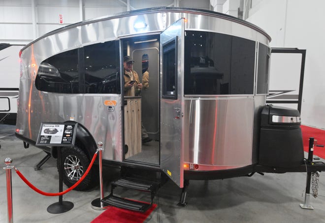 A unique shape and cured windows draws attention to the  Airstream Basecamp 20X at the 57th Annual Marvac RV and Camping Show.