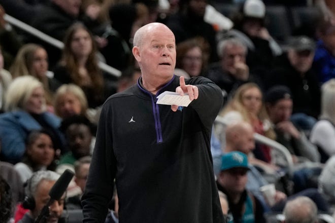 Charlotte Hornets head coach Steve Clifford signals from the sideline during the first half of an NBA basketball game against the Detroit Pistons, Friday, Feb. 3, 2023, in Detroit.