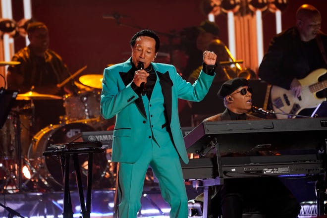Smokey Robinson performs "Tears of a Clown" during a tribute to Motown at the 65th annual Grammy Awards.