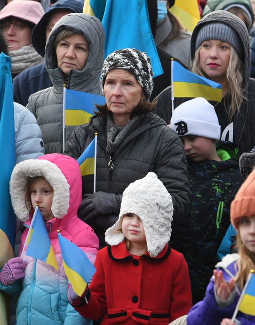 Members and supporters of the Ukrainian American community gather for an emergency rally, a day after a Russian invasion of Ukraine, at St. Josaphat Ukrainian Catholic Church in Warren, Michigan on February 24, 2022.